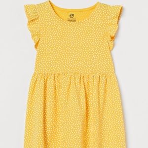 H&M Organic Cotton Dress .Yellow with white hearts .Size 6X/7